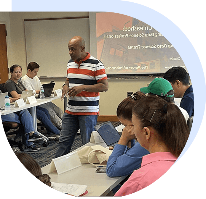 Instructor leading classroom workshop with students
