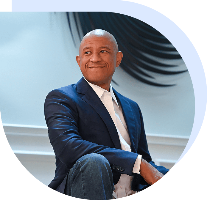 Smiling bald man in navy suit