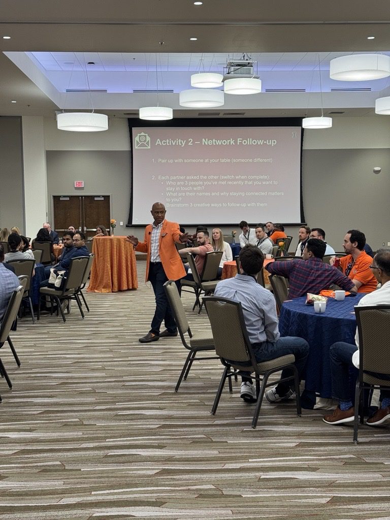 Presenter addressing attendees at networking workshop